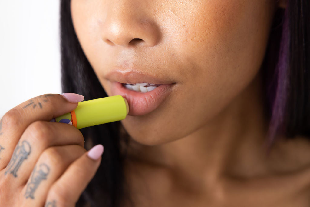 Girl applying lip massage