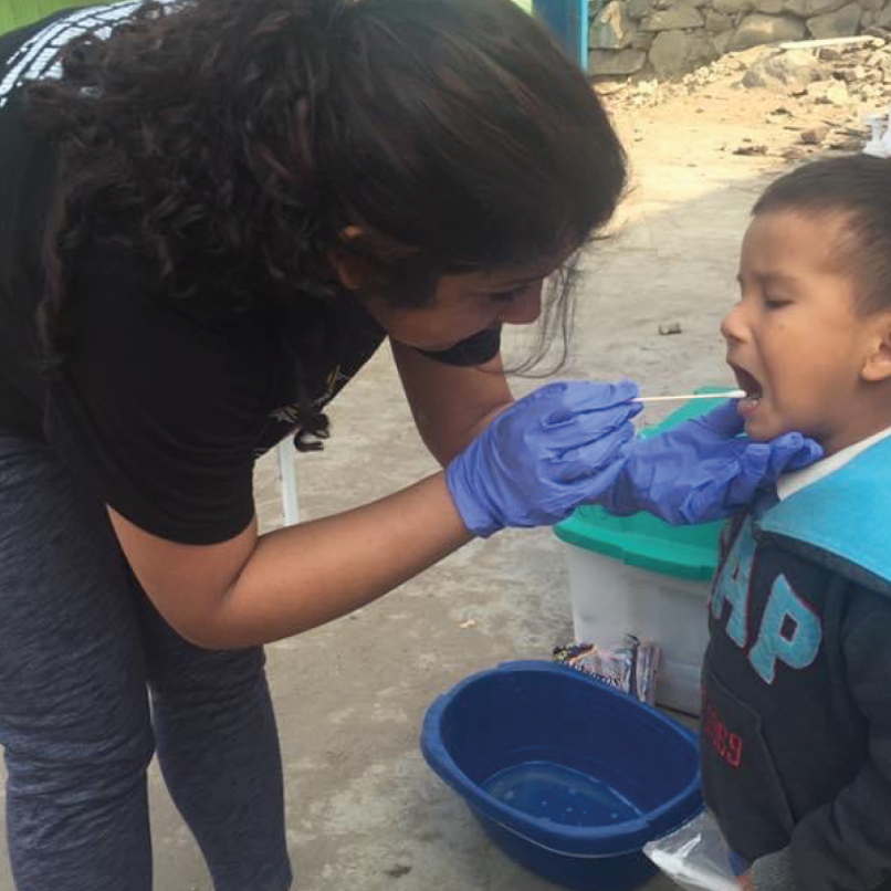 Founder taking care of a child